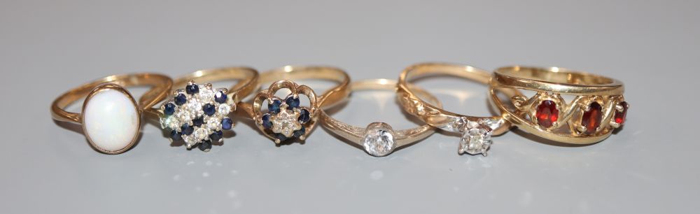 Five assorted modern 9ct gold and gem or paste set dress rings and one other ring, 9ct gross 10 grams.